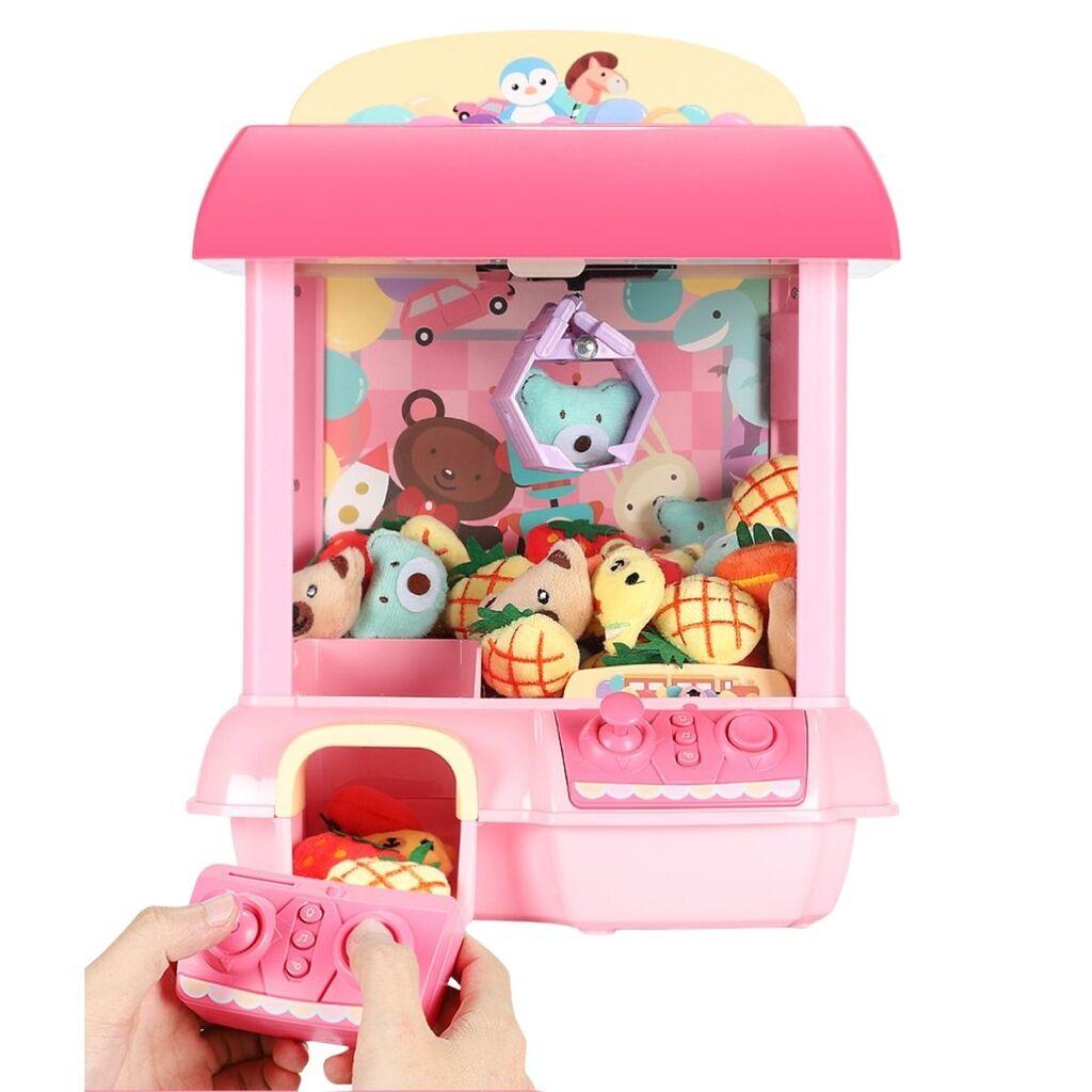 Mašina sa hvataljkom za igračke roze