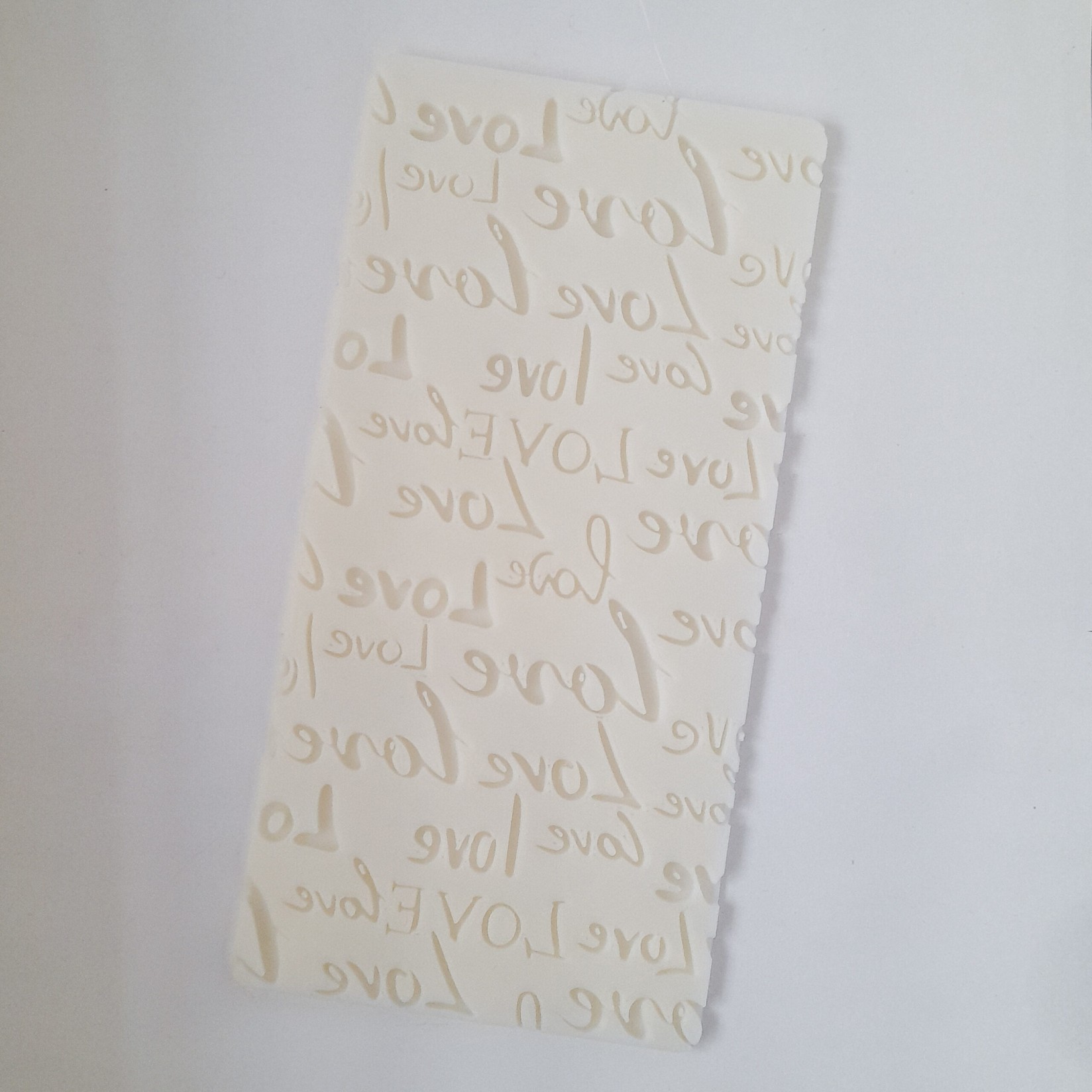 KREATIVNI SLATKIŠI Emboser pločica za dekorisanje kolača Love, 8x16 cm, Bela