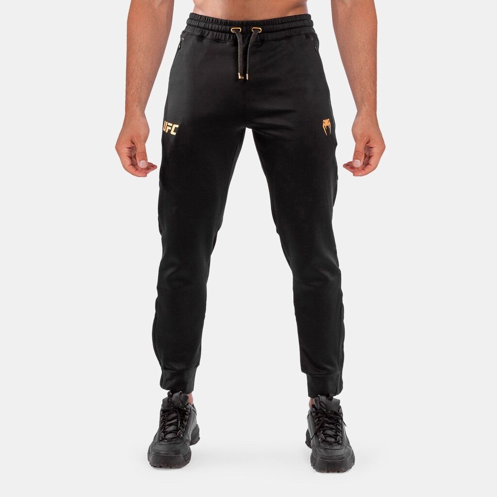 Venum Muški donji deo trenerke UFC Authentic Fight Night, Crno-zlatne boje